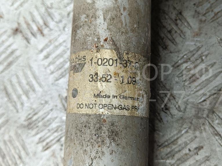 Амортизатор задний левый