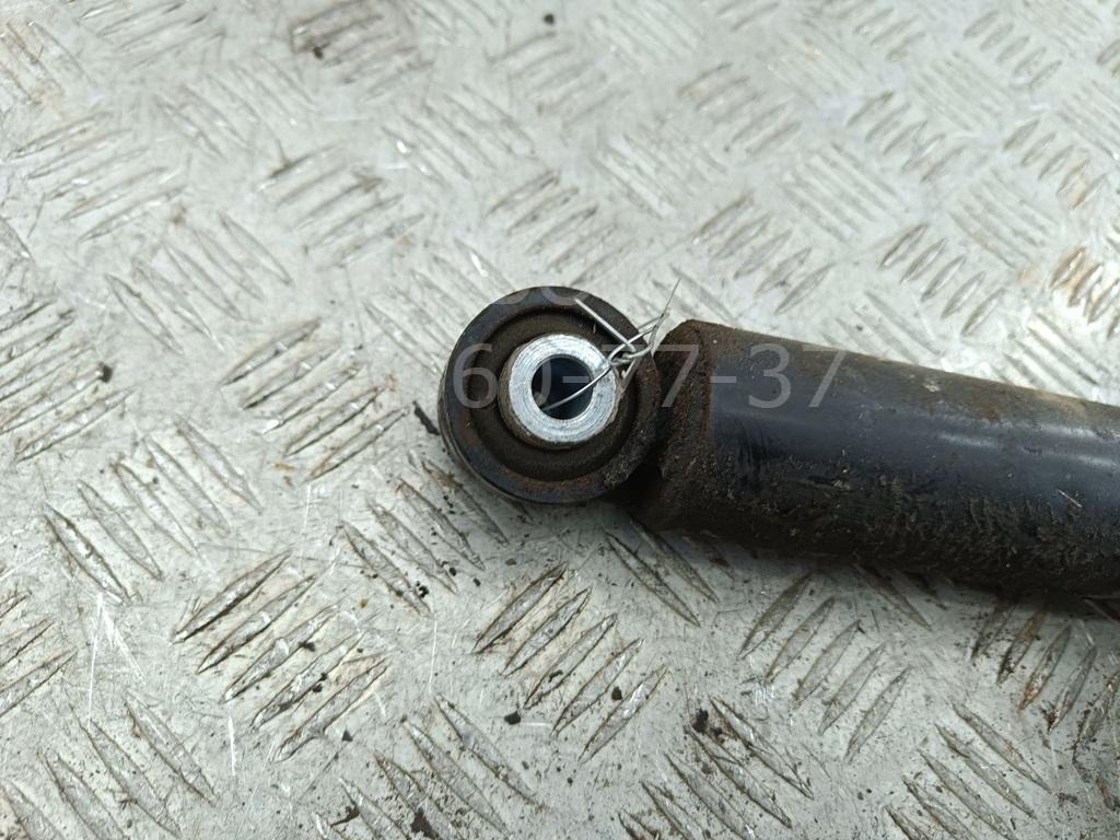 Амортизатор задний левый