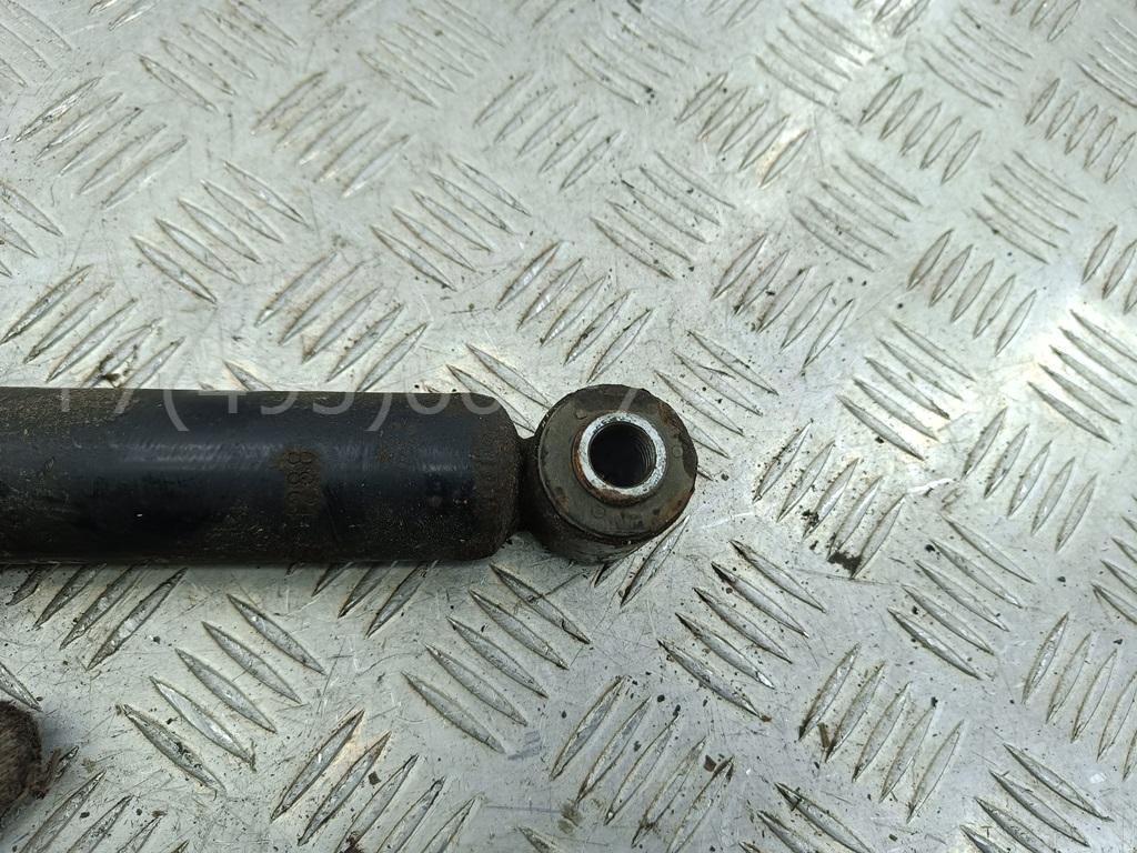 Амортизатор задний левый