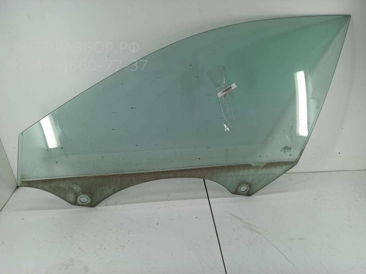 Стекло двери передней левой