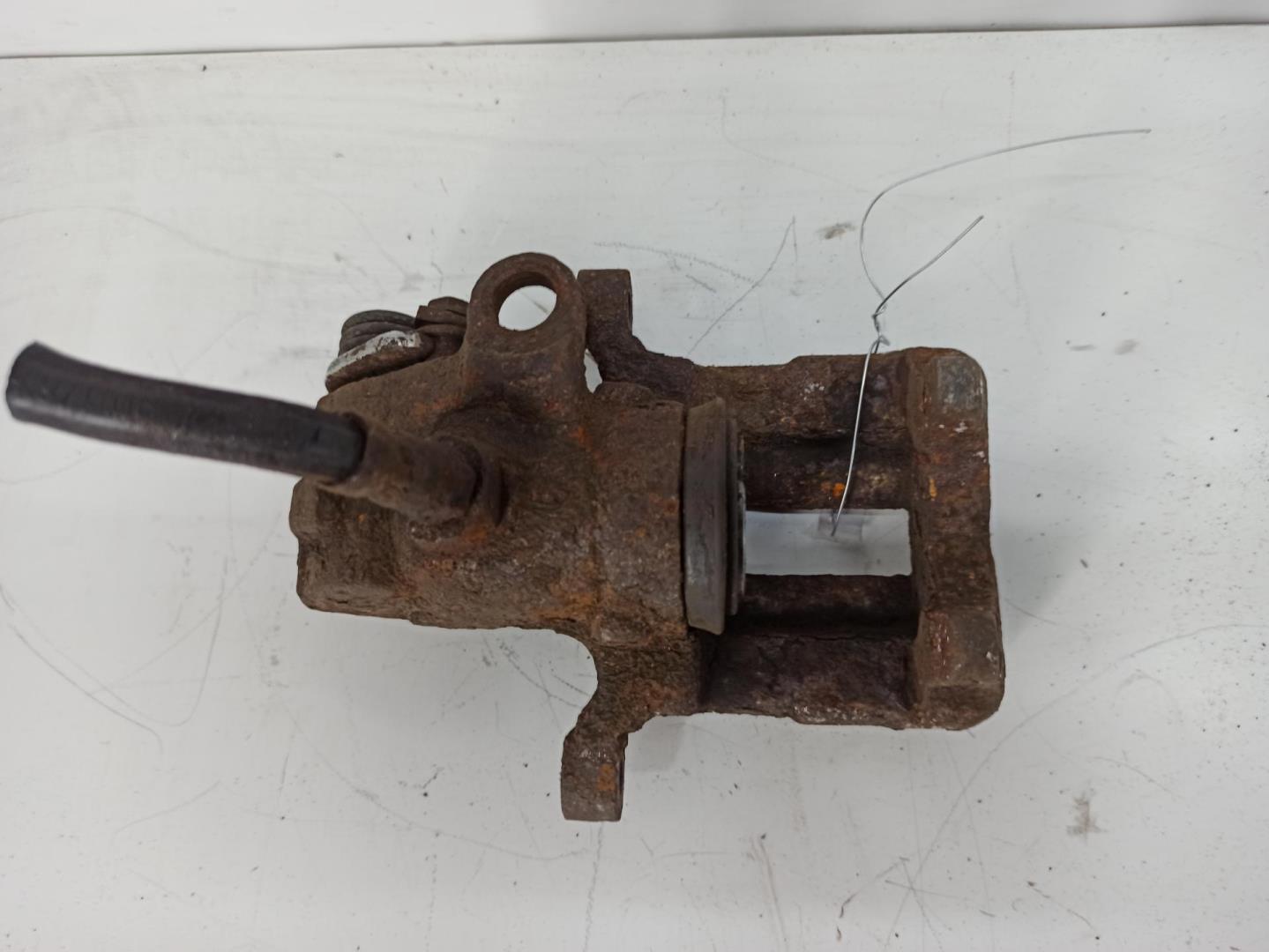 Суппорт задний левый