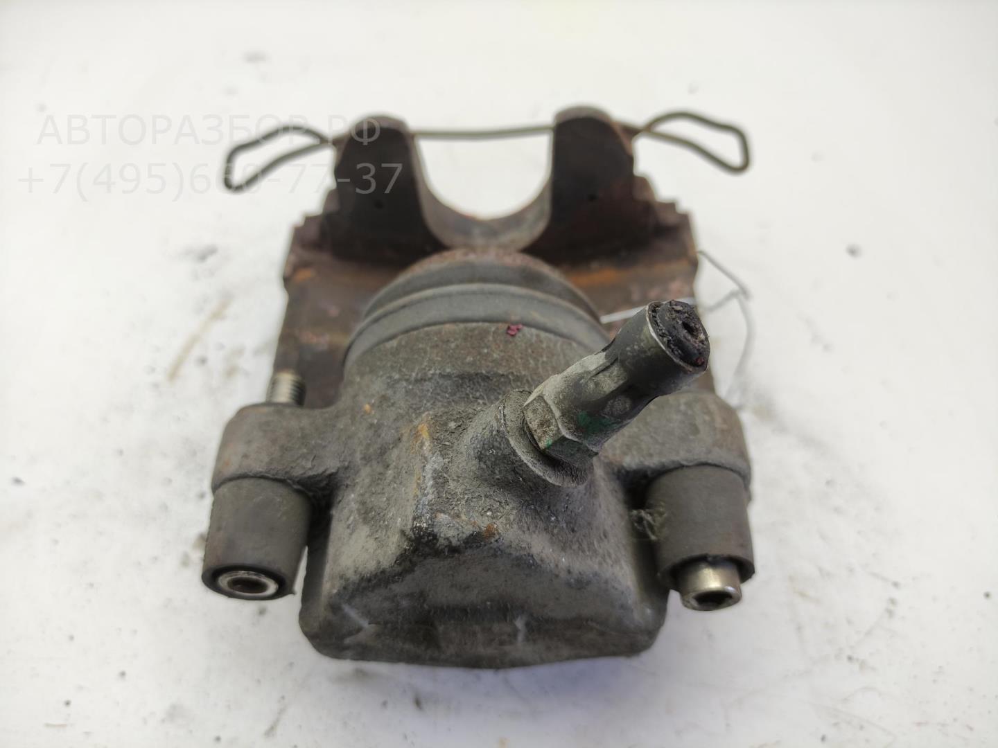 Суппорт передний левый