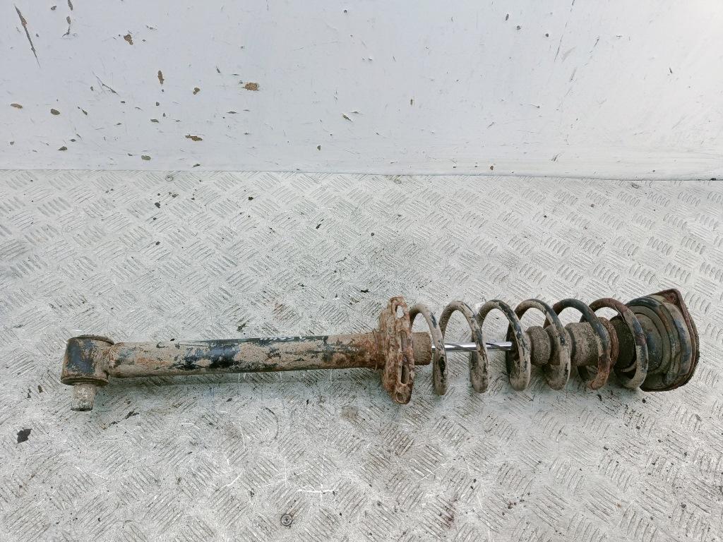 Амортизатор задний левый