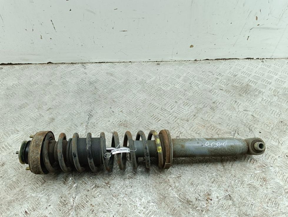 Амортизатор задний левый