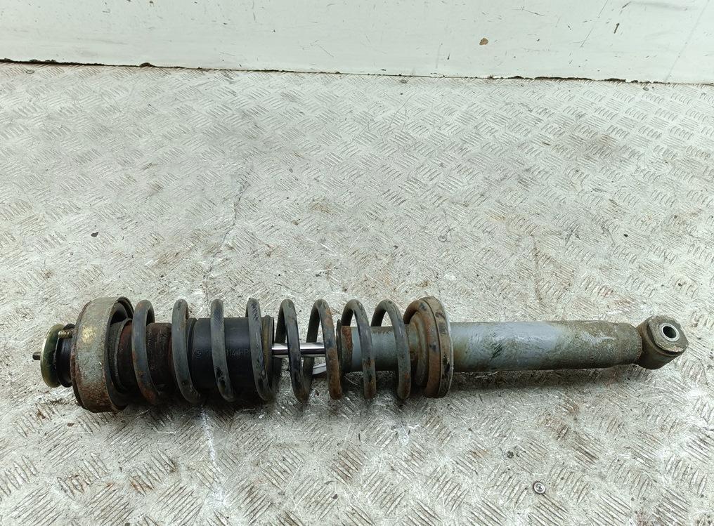 Амортизатор задний левый