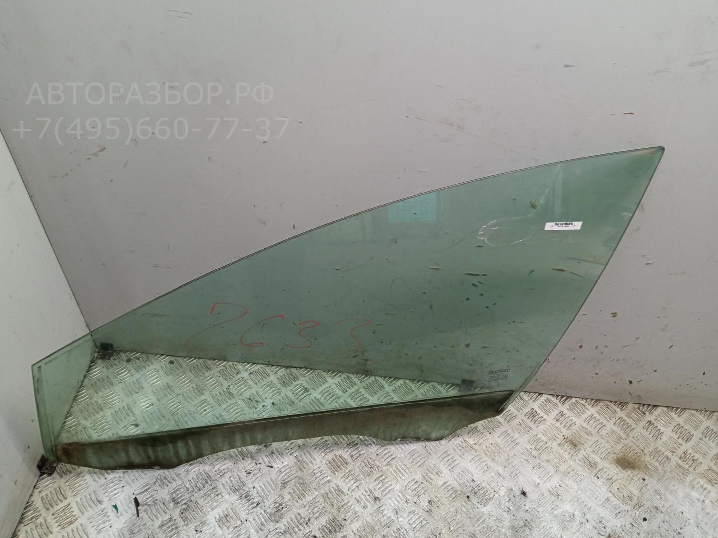 Стекло двери передней левой