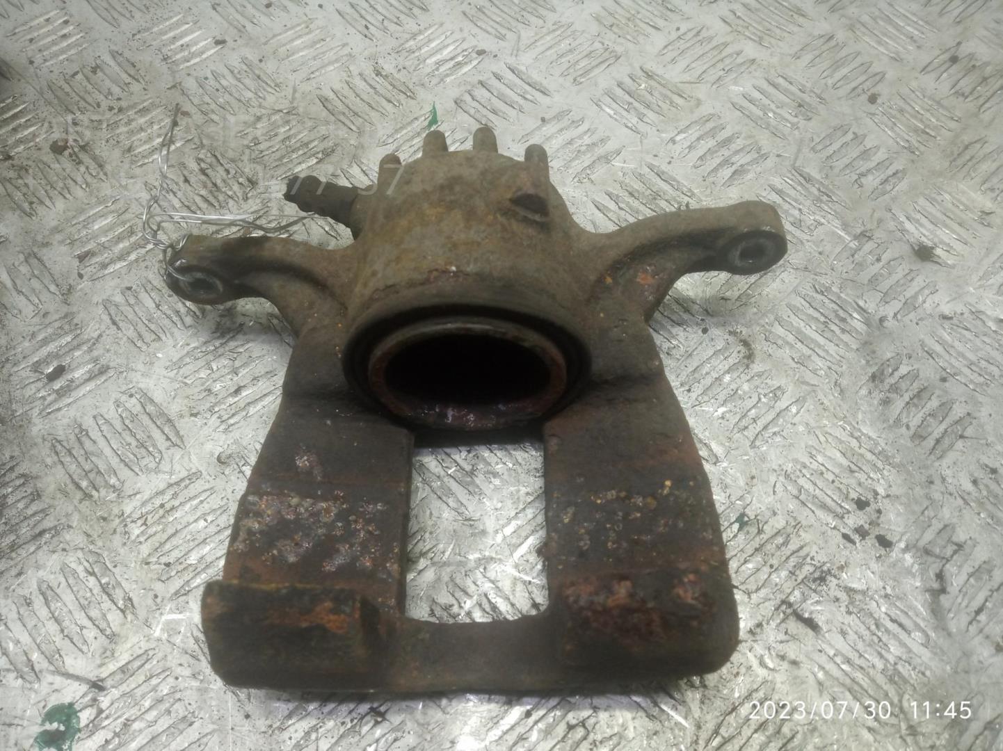 Суппорт передний левый