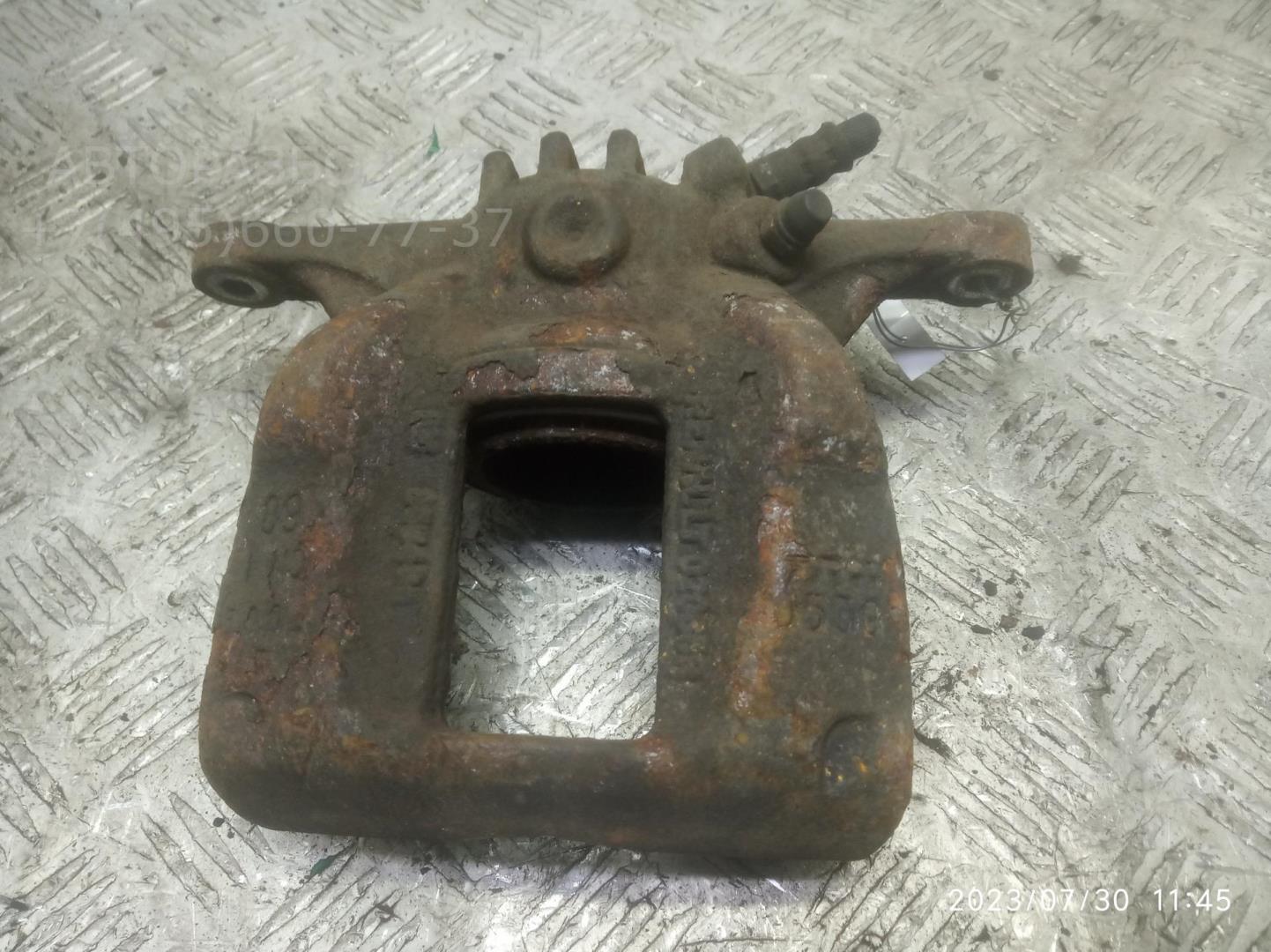 Суппорт передний левый