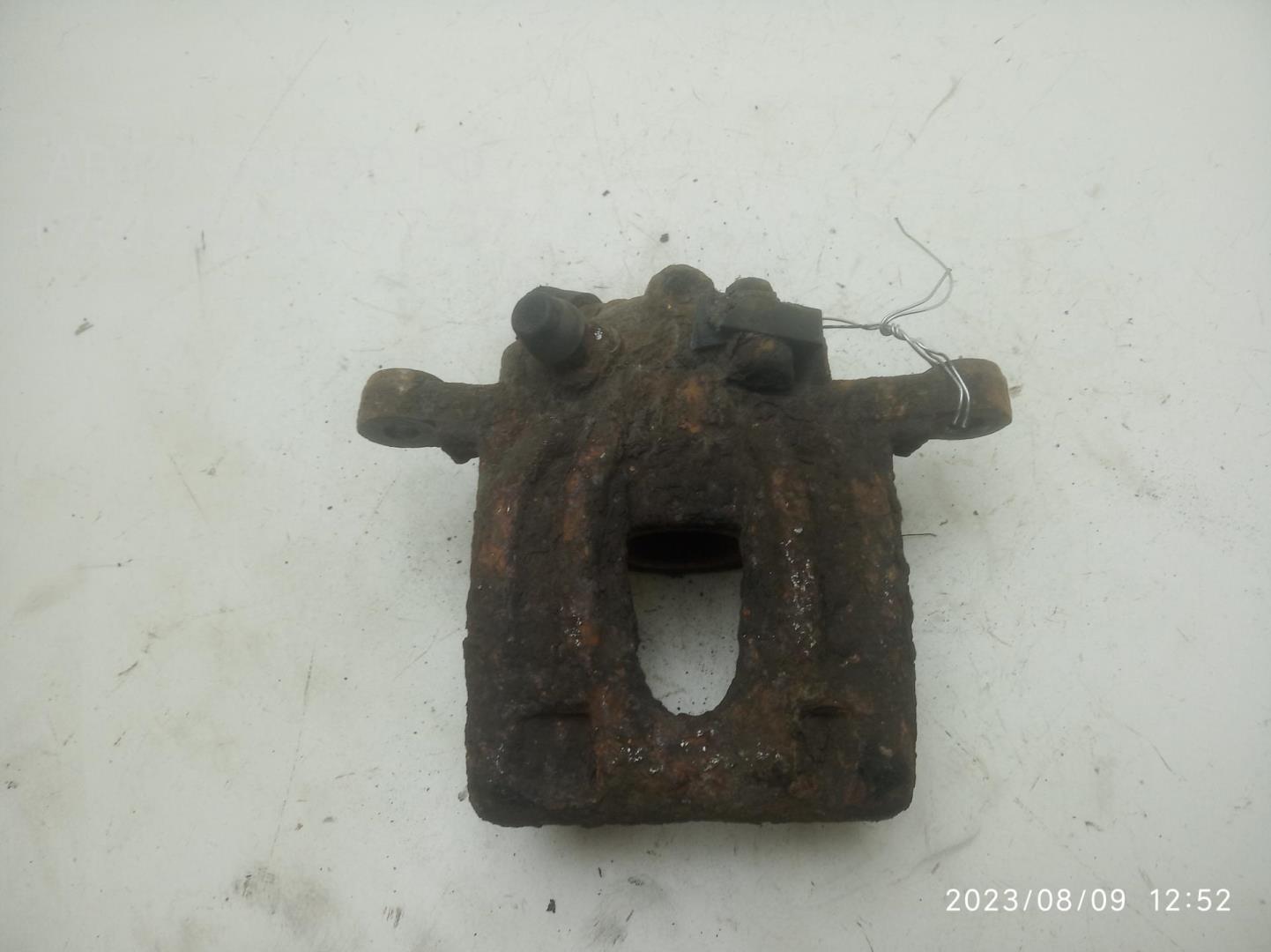 Суппорт задний левый