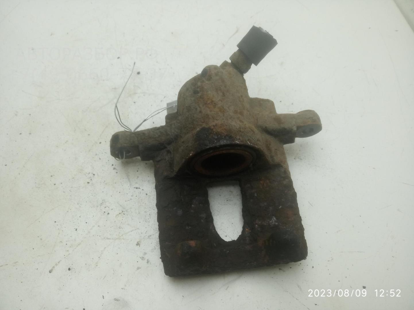 Суппорт задний левый