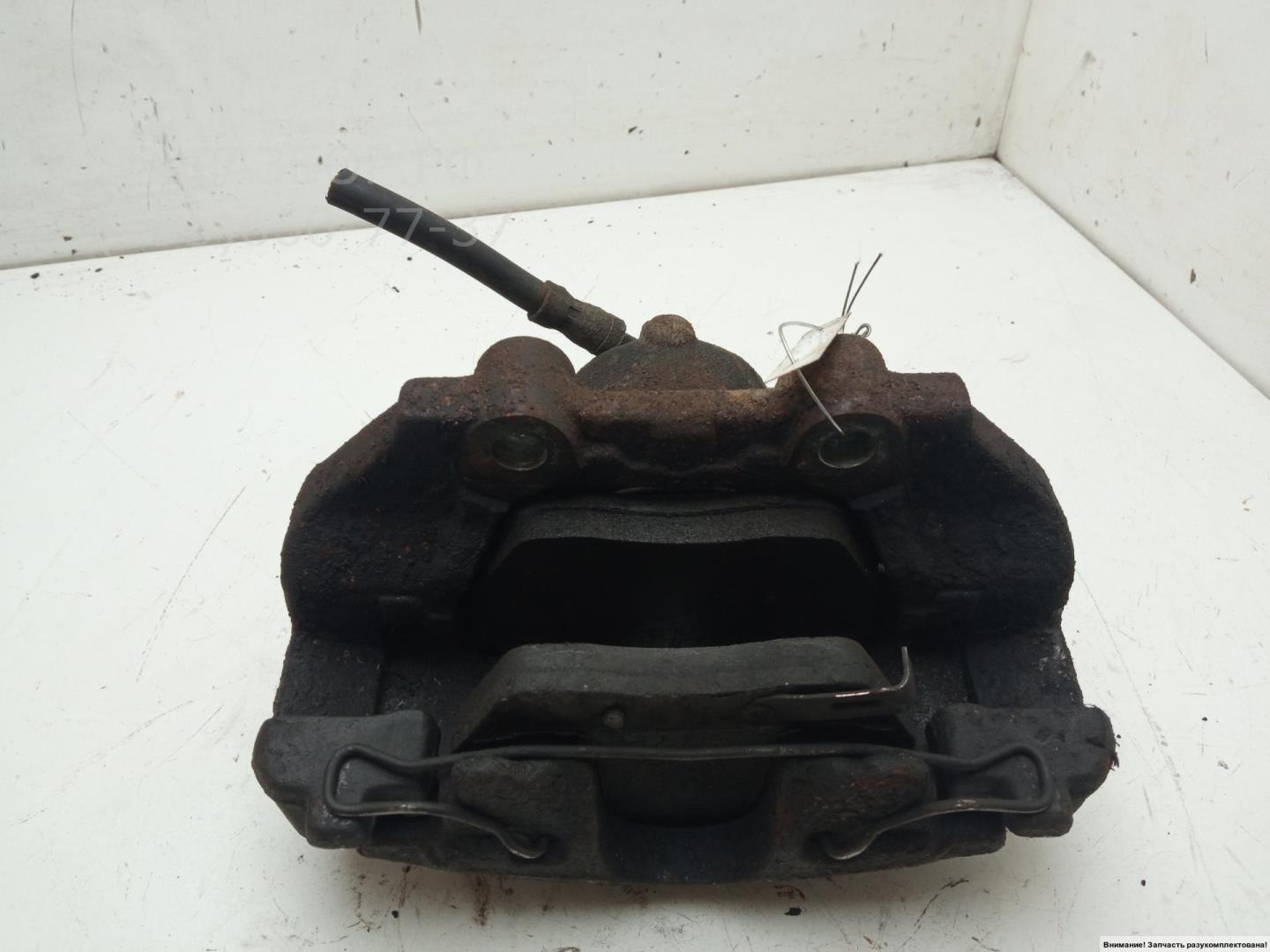 Суппорт передний левый