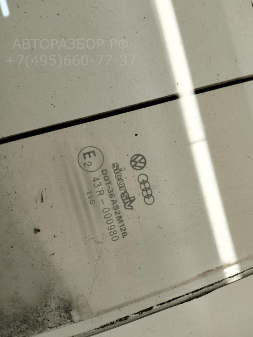 Стекло двери задней левой