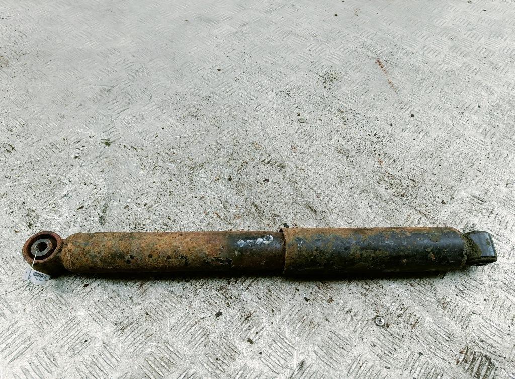 Амортизатор задний левый