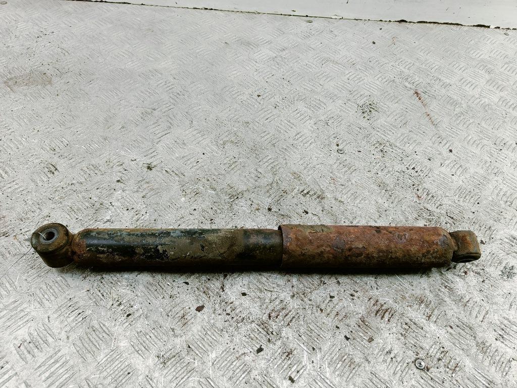 Амортизатор задний левый