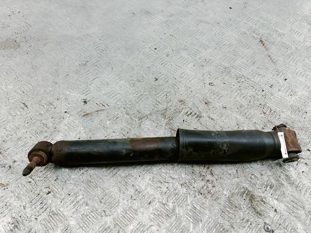 Амортизатор задний левый