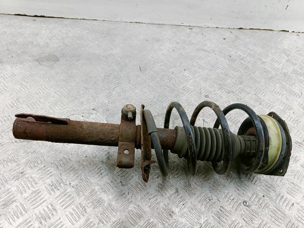 Амортизатор передний левый