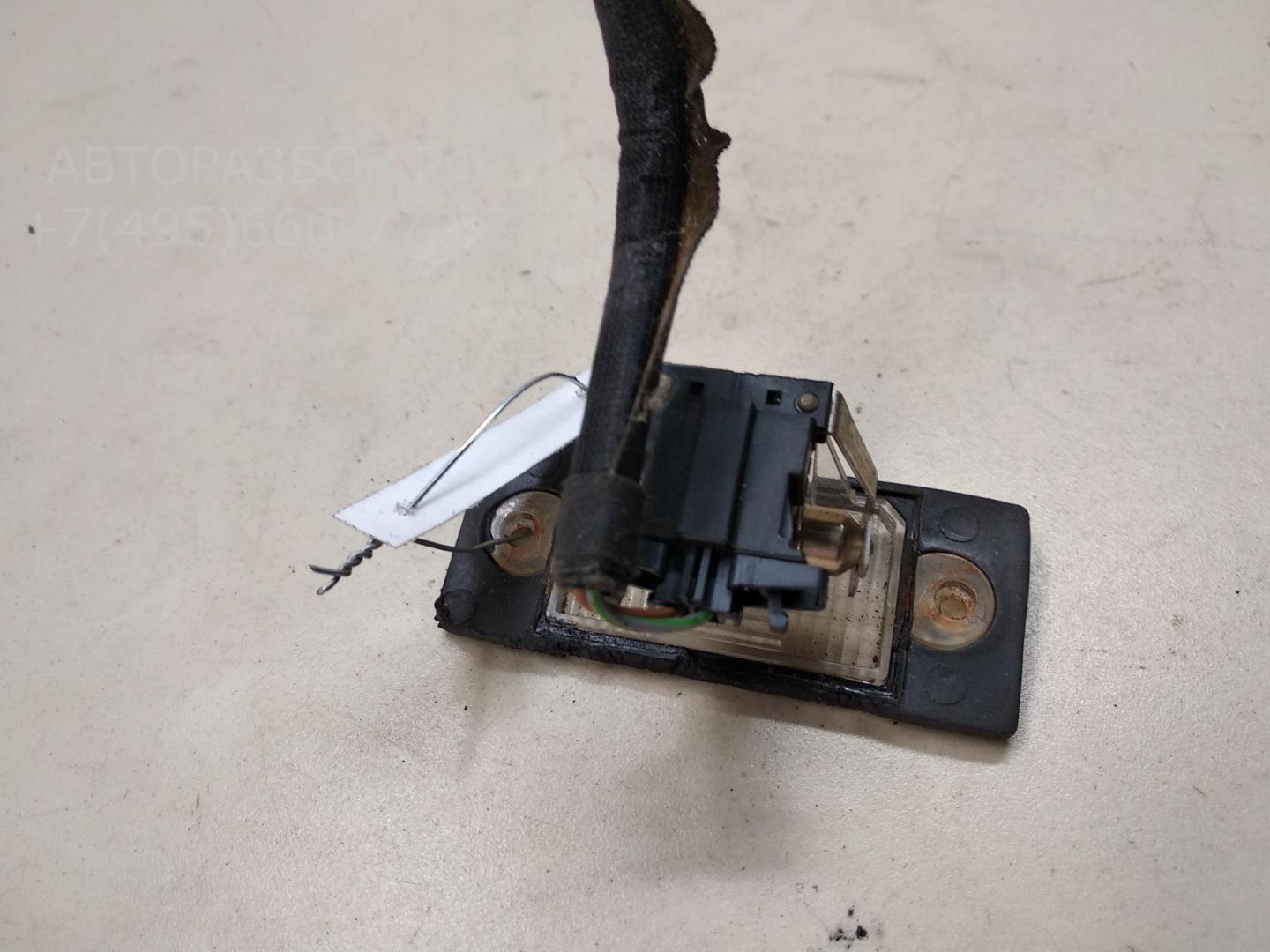 Фонарь подсветки номера