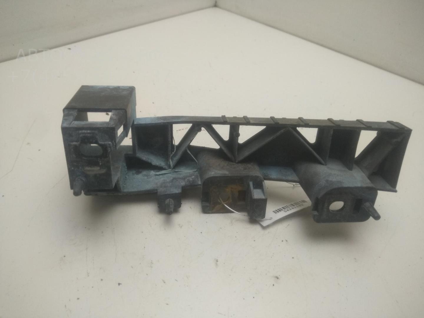 Кронштейн фар правый