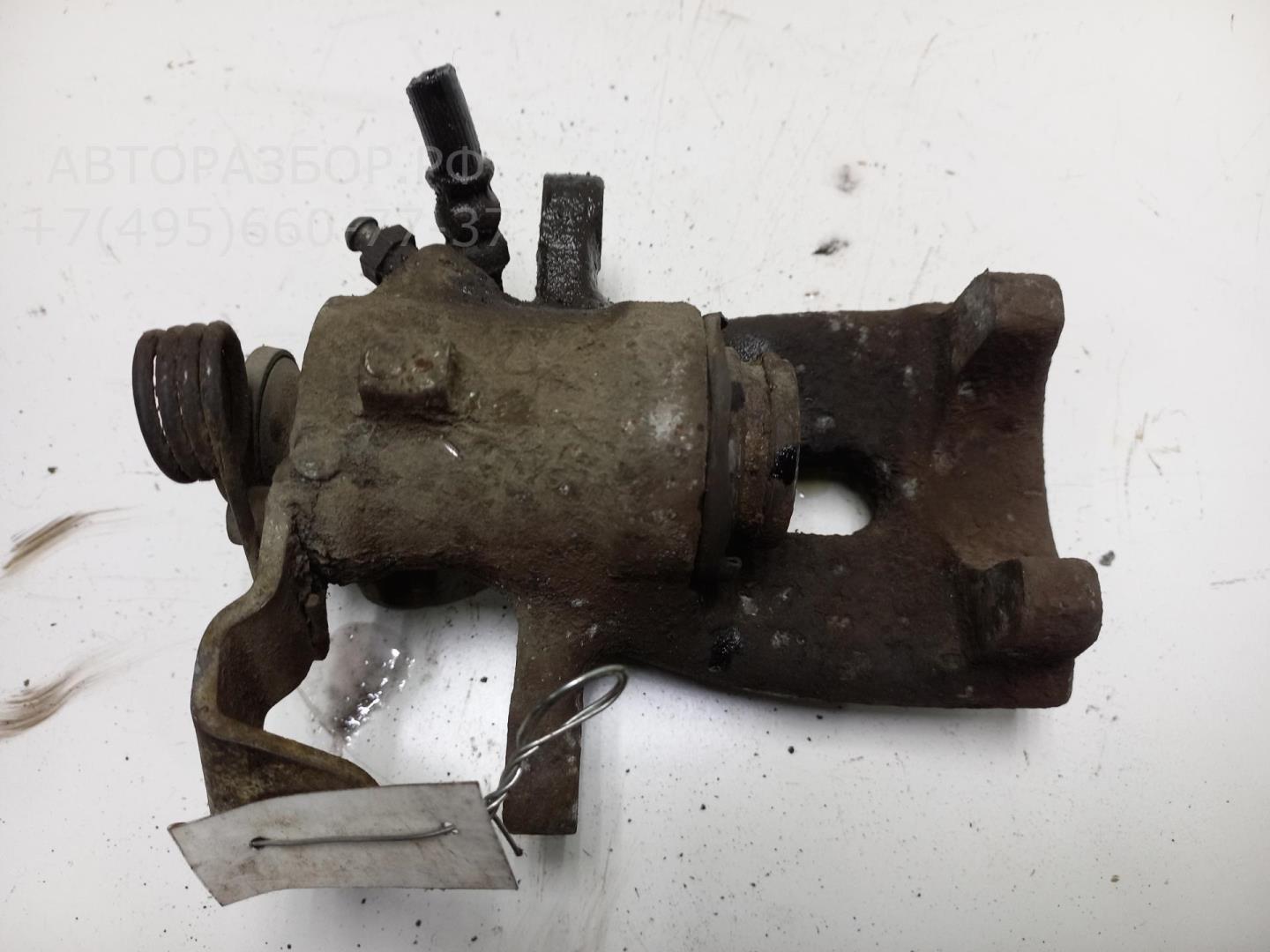 Суппорт задний левый