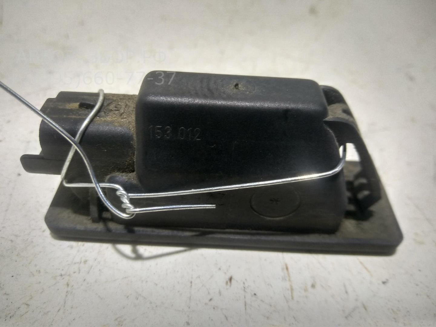 Фонарь подсветки номера