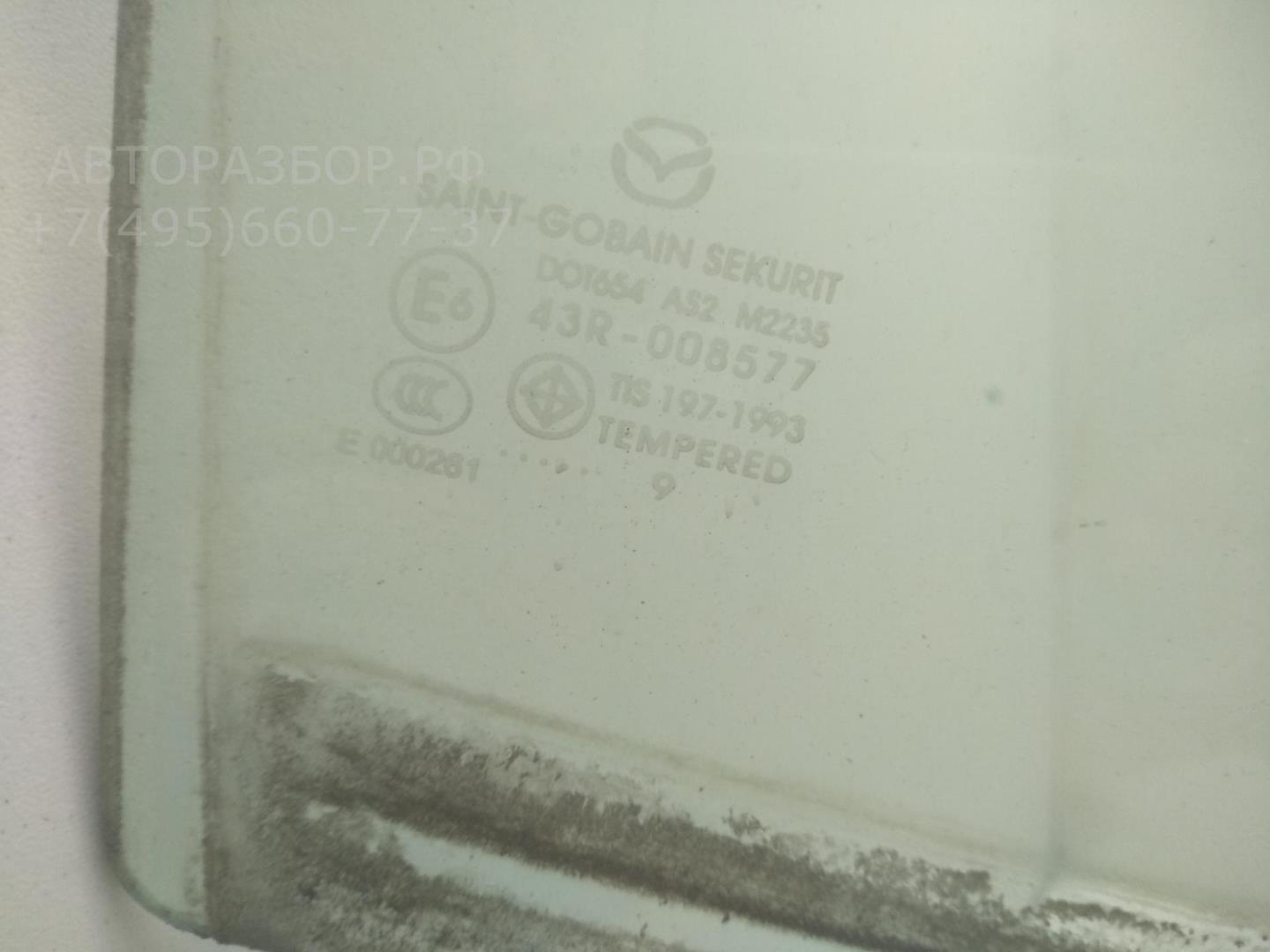 Стекло двери задней правой