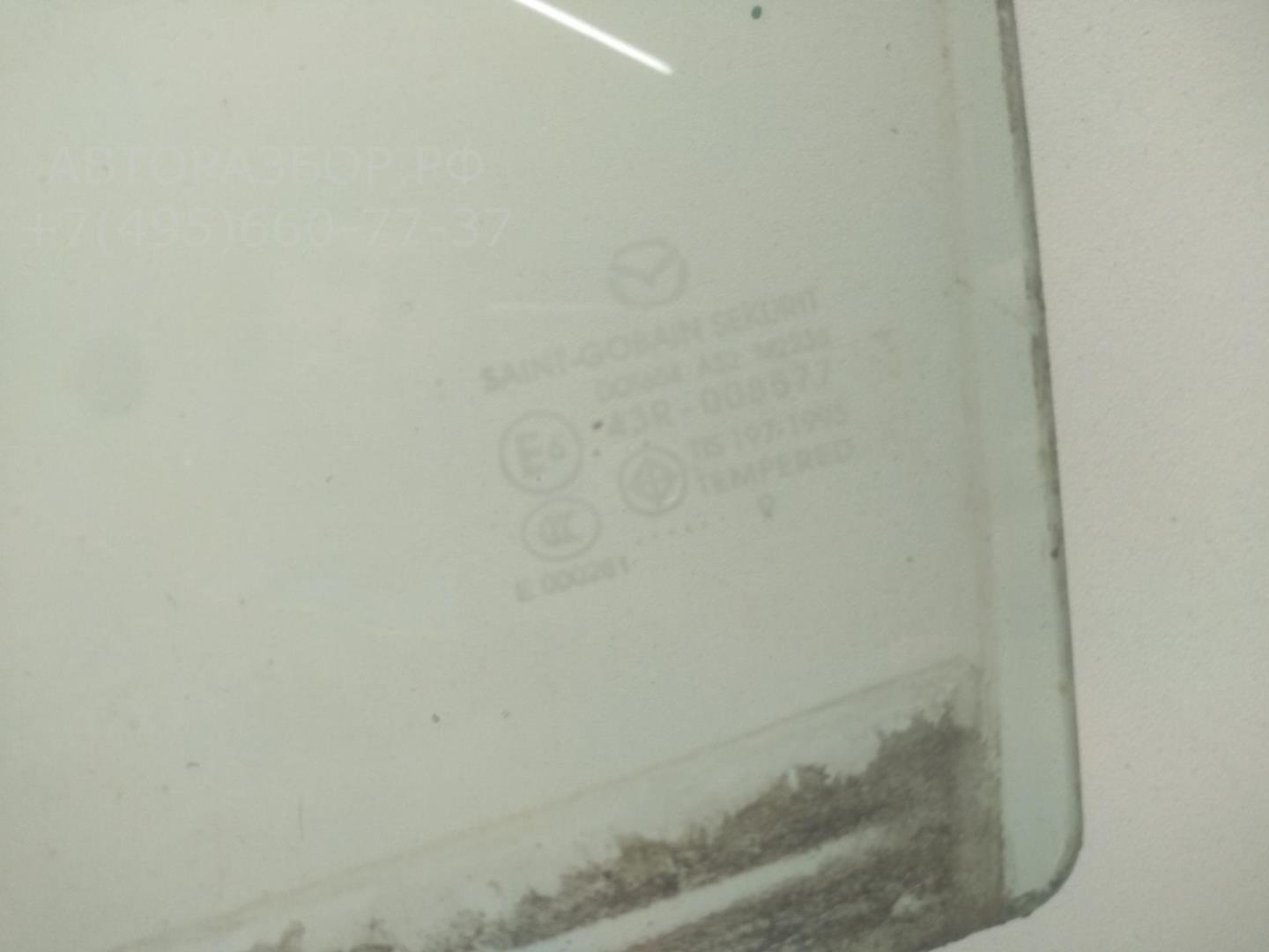 Стекло двери задней левой