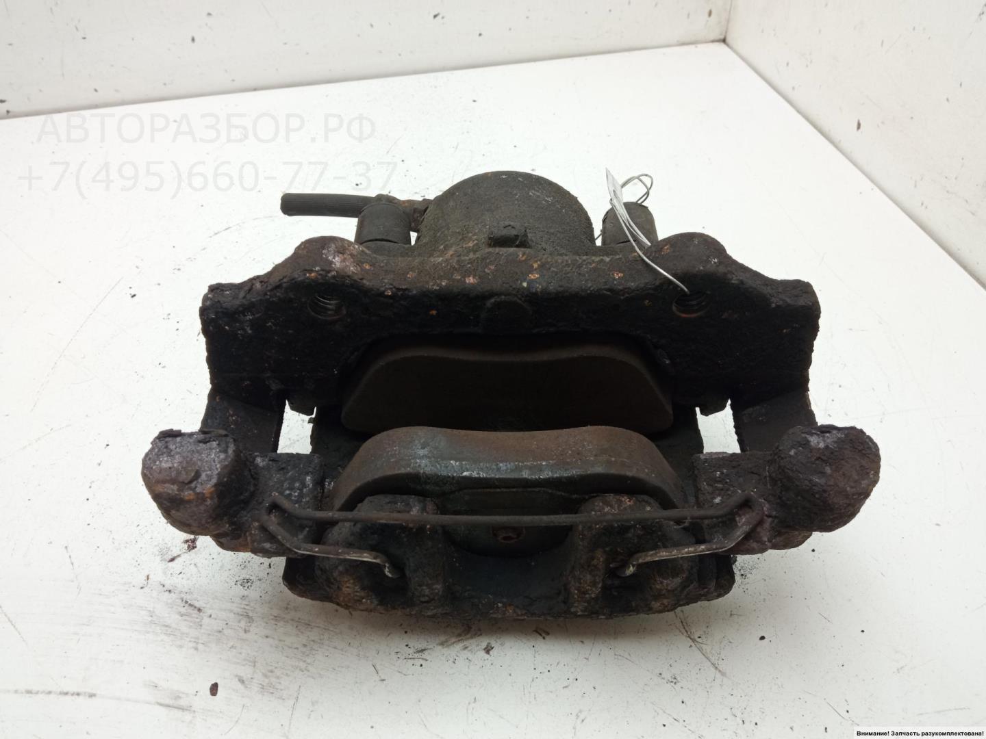 Суппорт передний левый