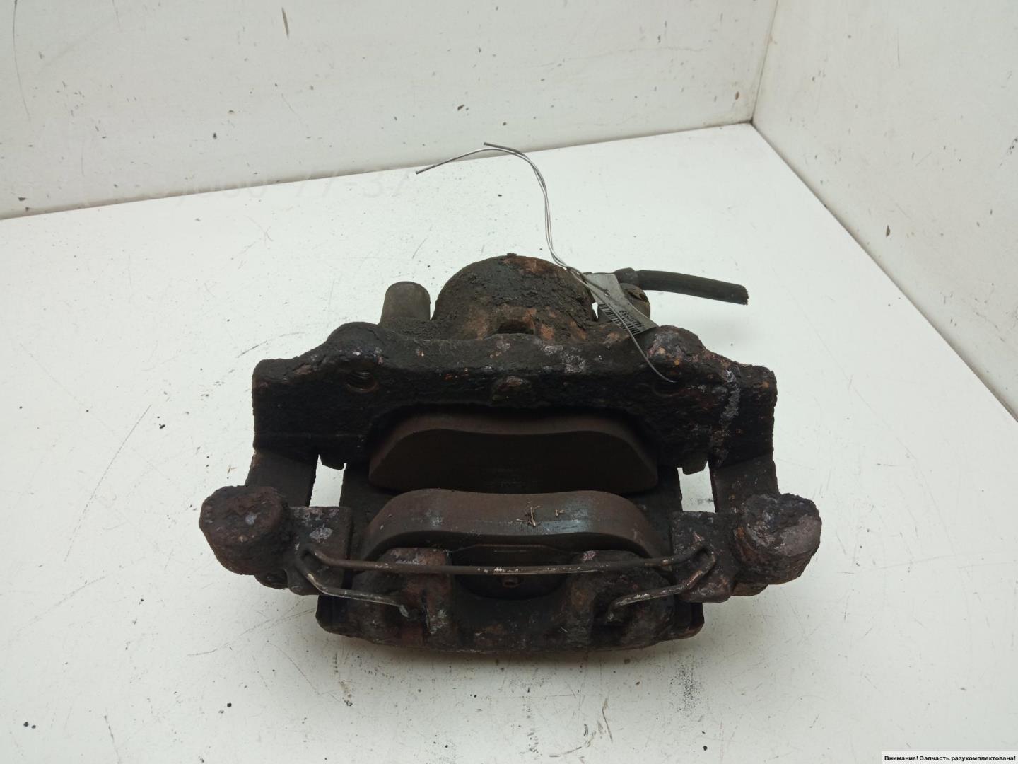 Суппорт передний левый