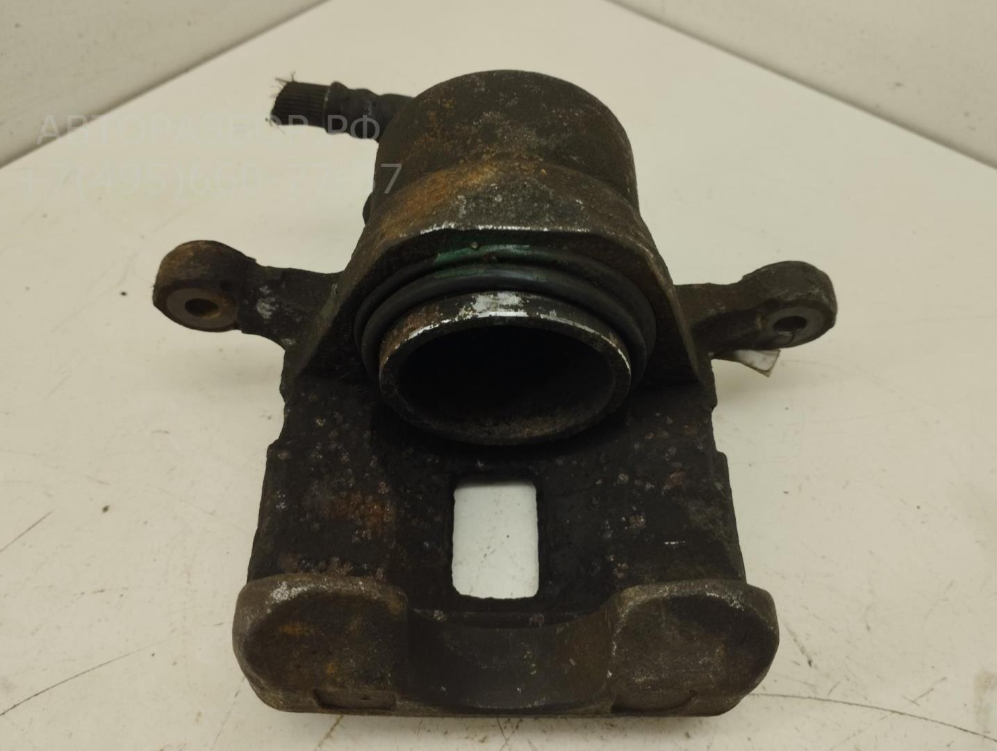 Суппорт передний левый