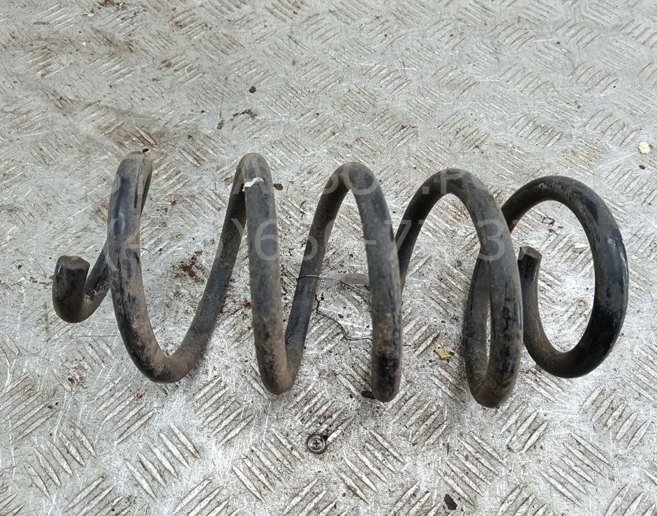 Пружина задняя