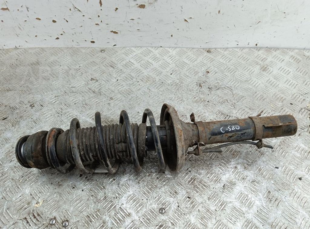 Амортизатор передний левый