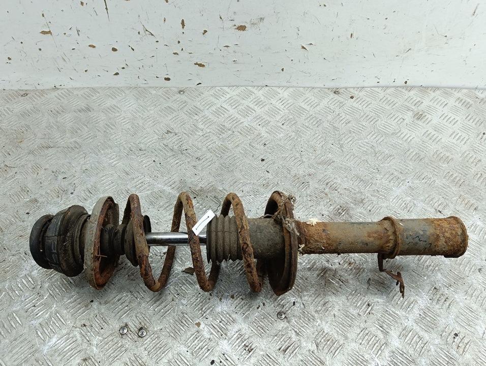 Амортизатор передний левый