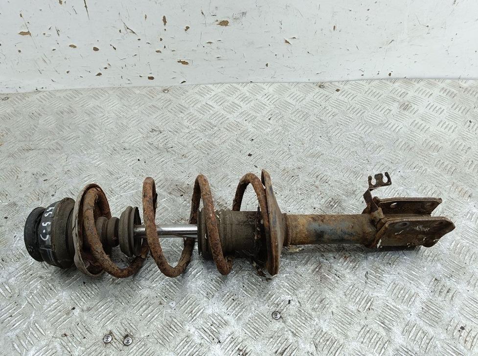 Амортизатор передний левый