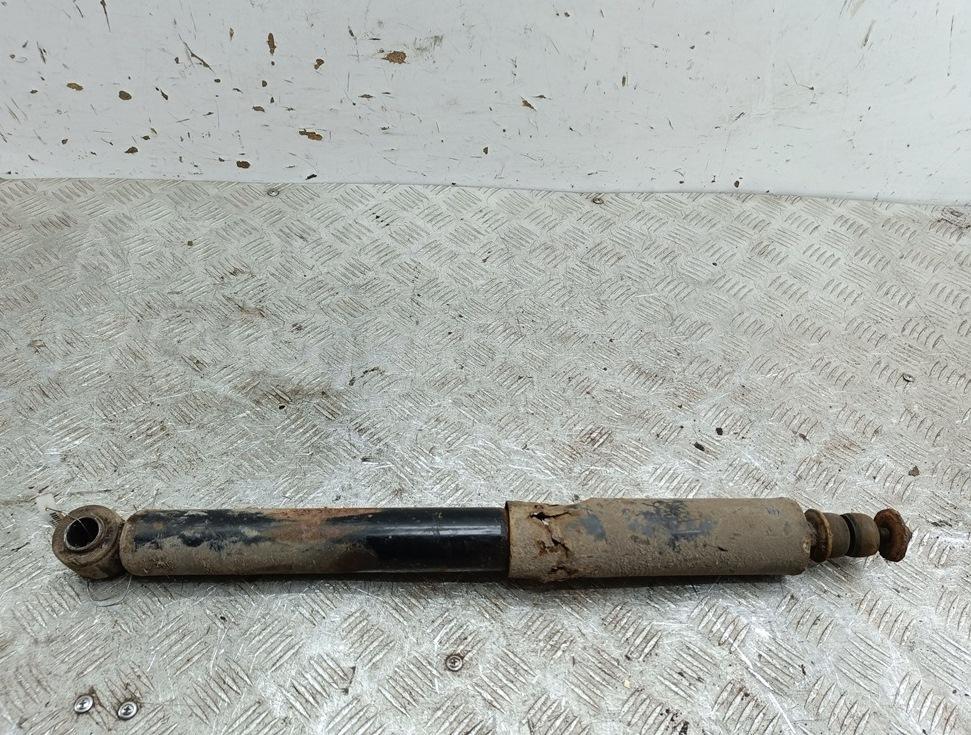 Амортизатор задний левый