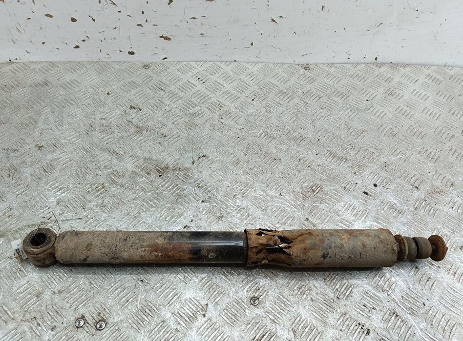 Амортизатор задний левый