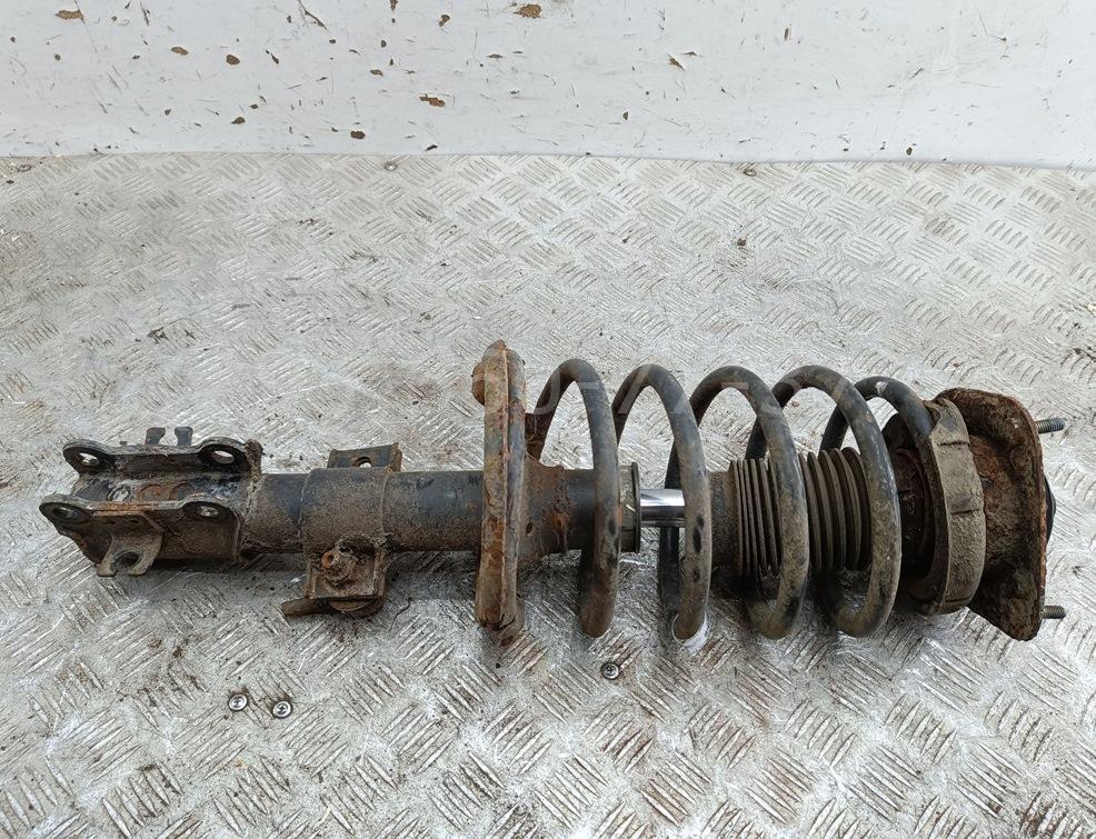 Амортизатор передний левый