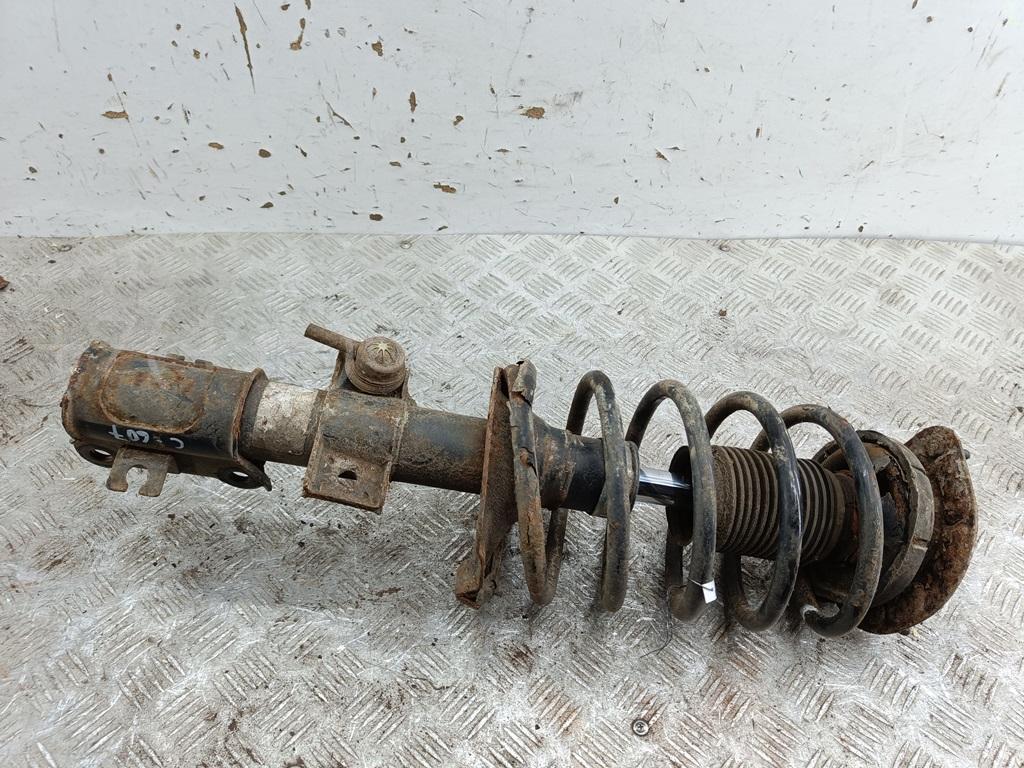 Амортизатор передний левый