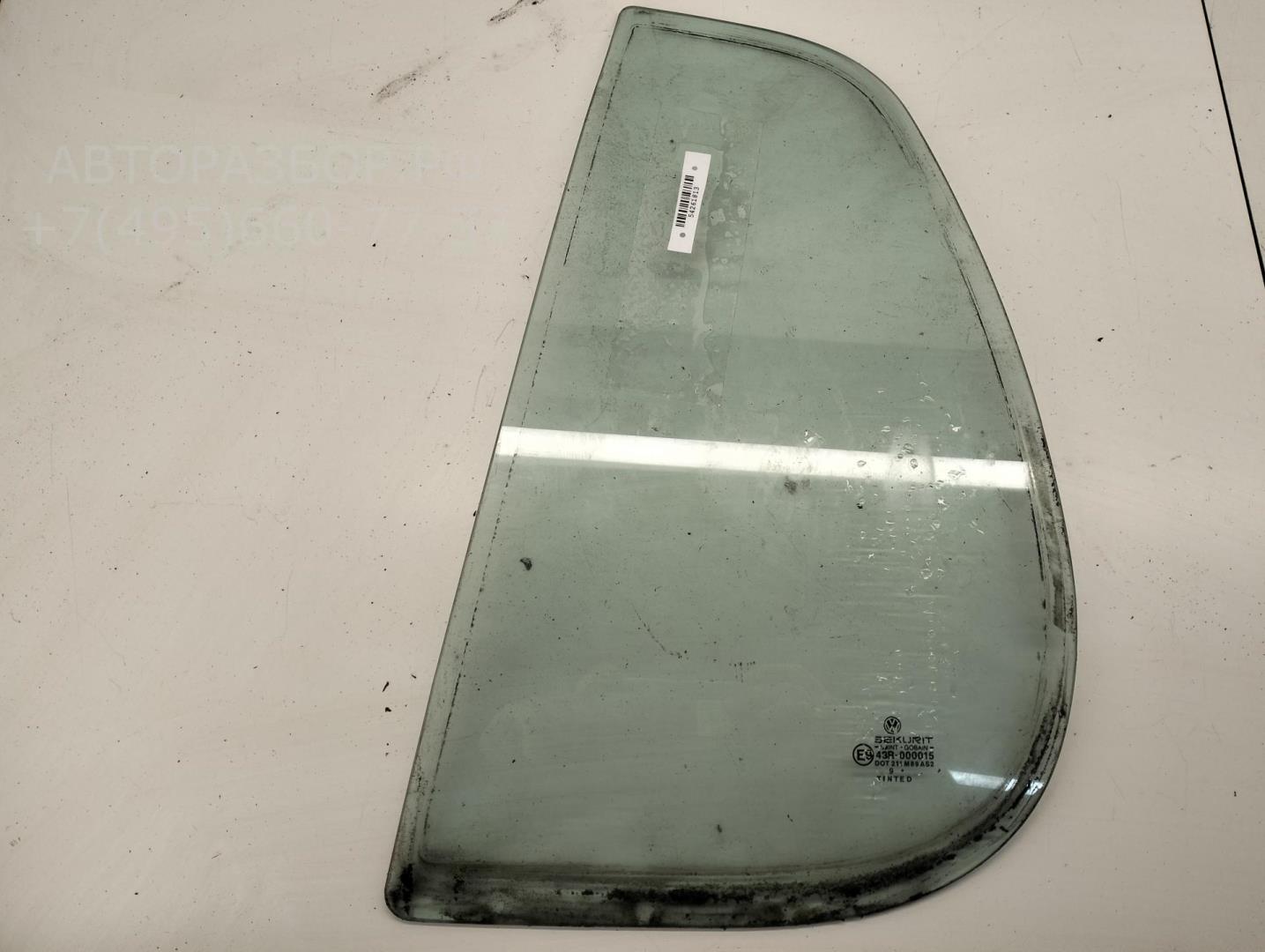 Стекло двери задней левой (форточка)