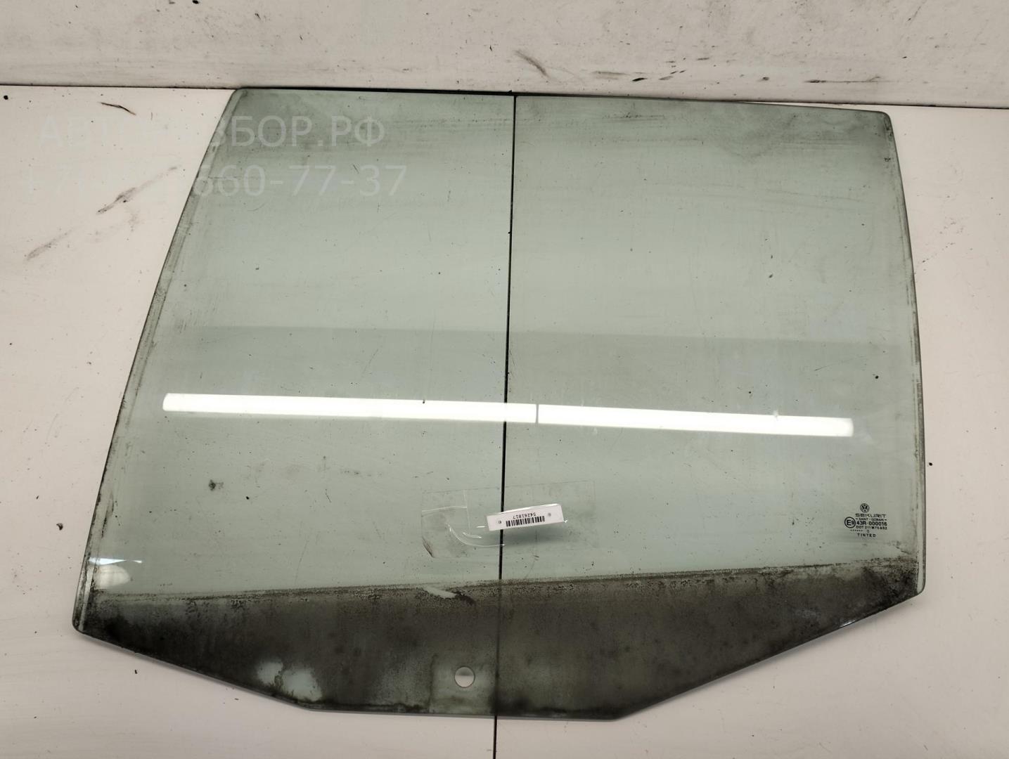 Стекло двери задней левой