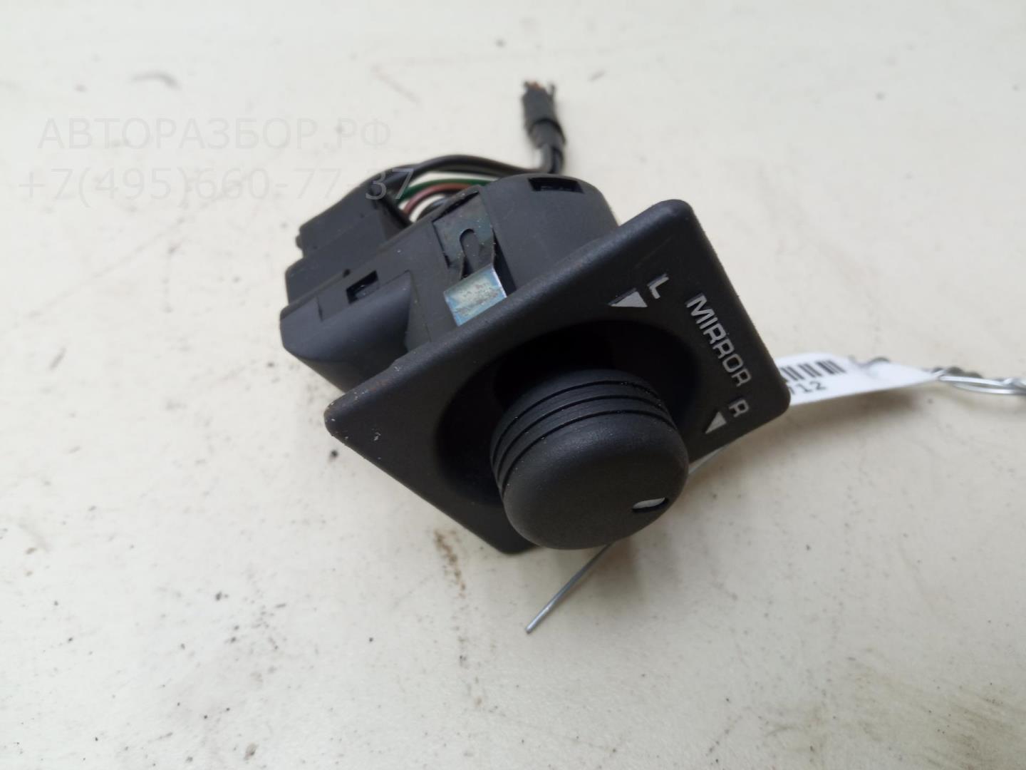 Кнопка регулировки зеркала