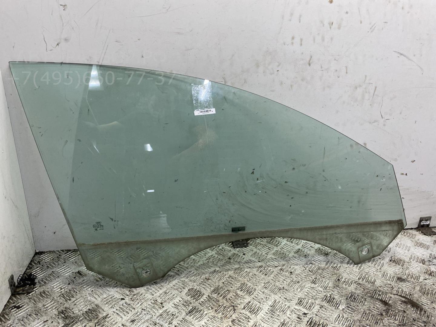 Стекло двери передней правой