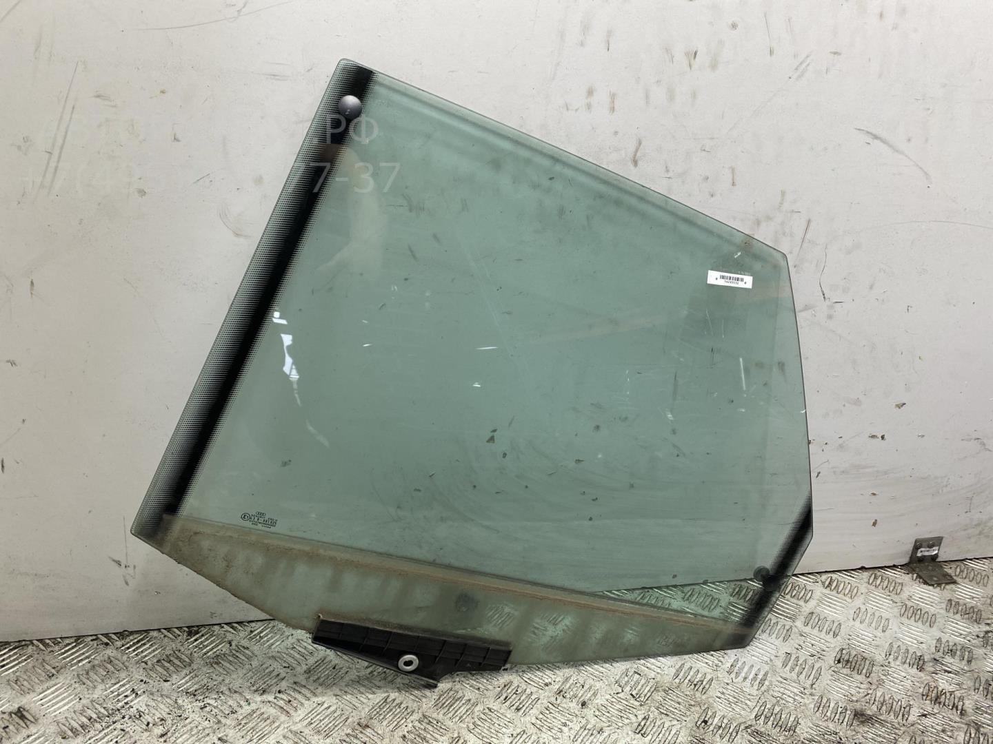 Стекло двери задней левой