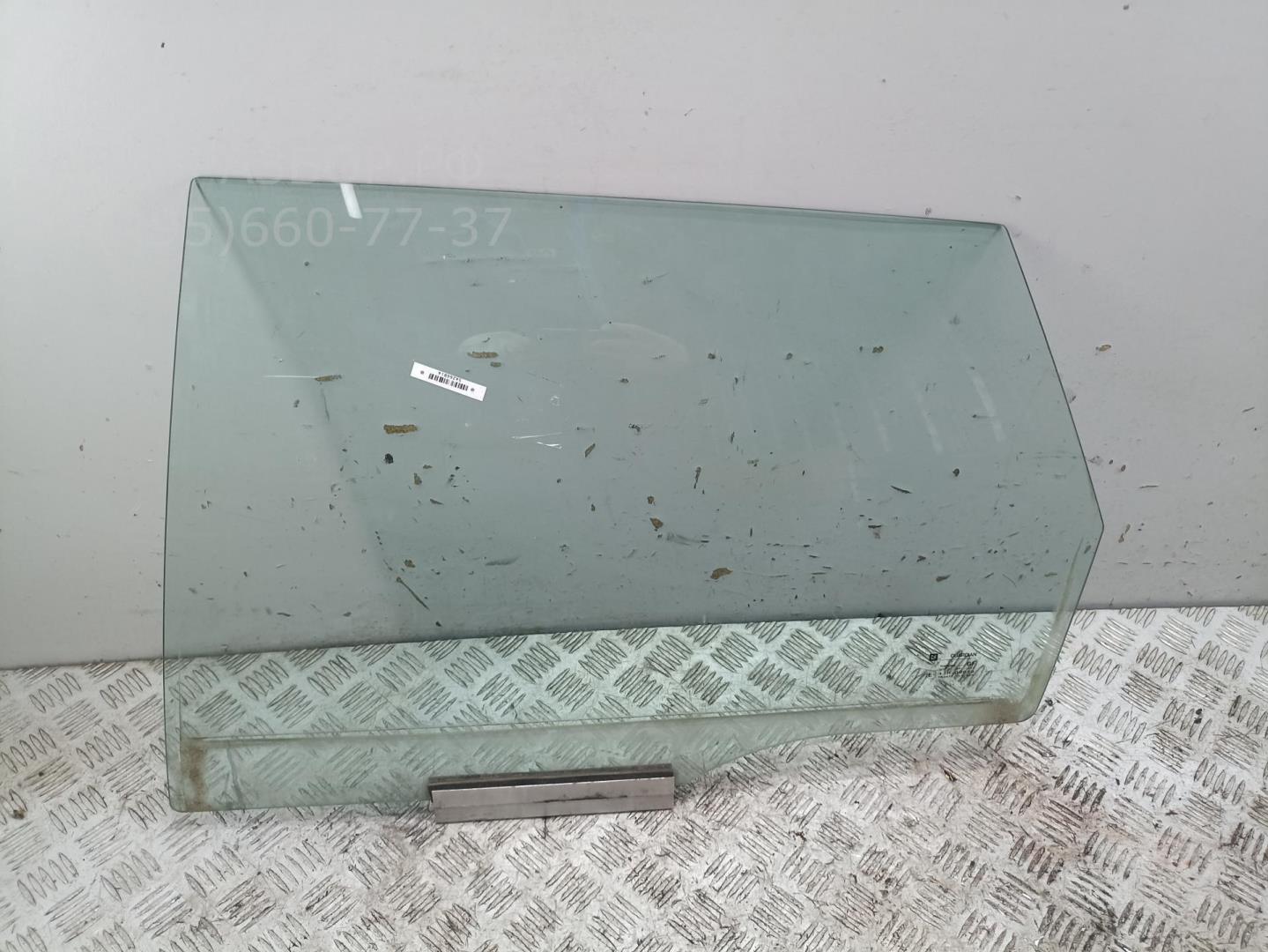 Стекло двери задней левой