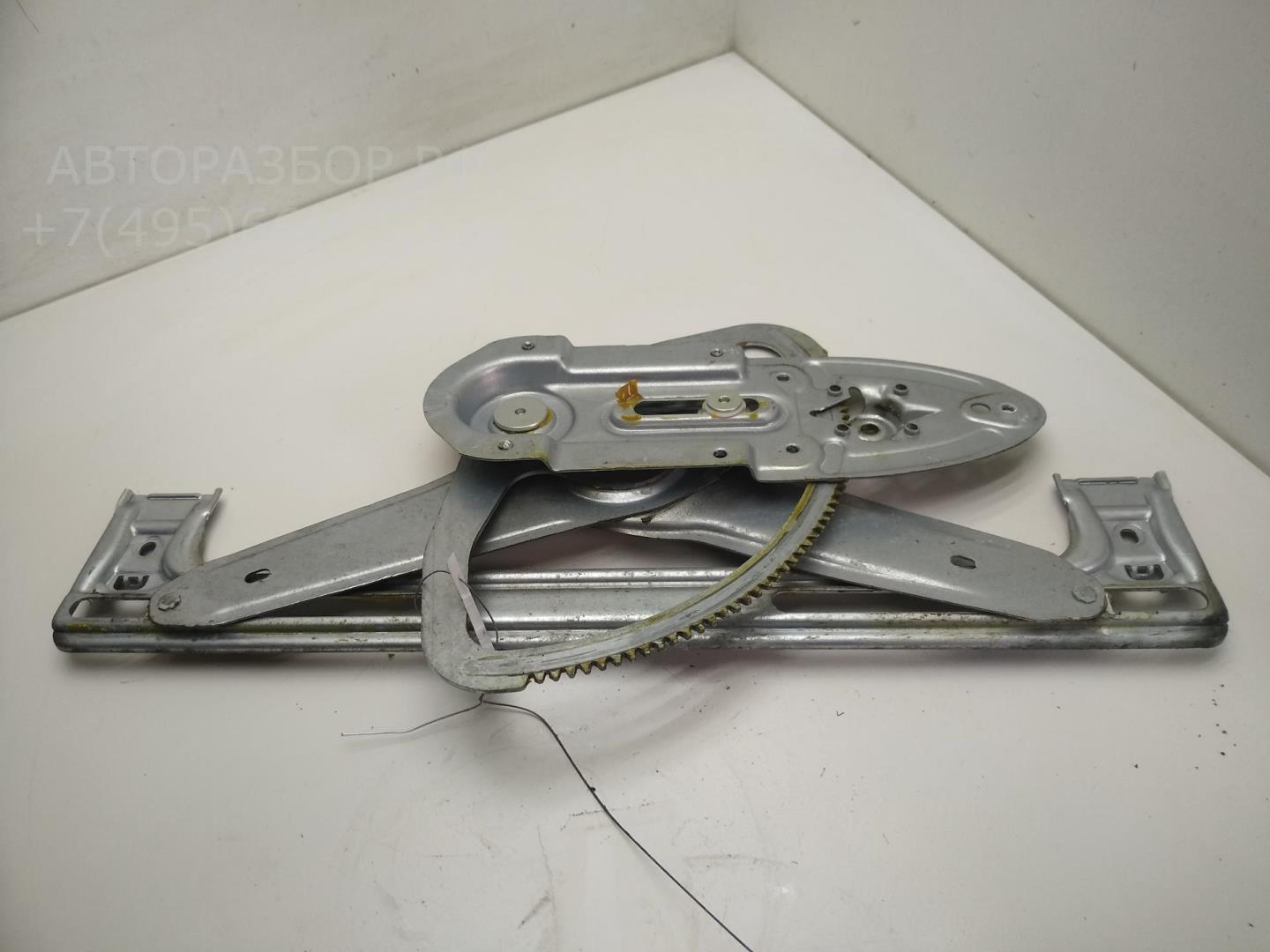 Стеклоподъемник электр. задний левый