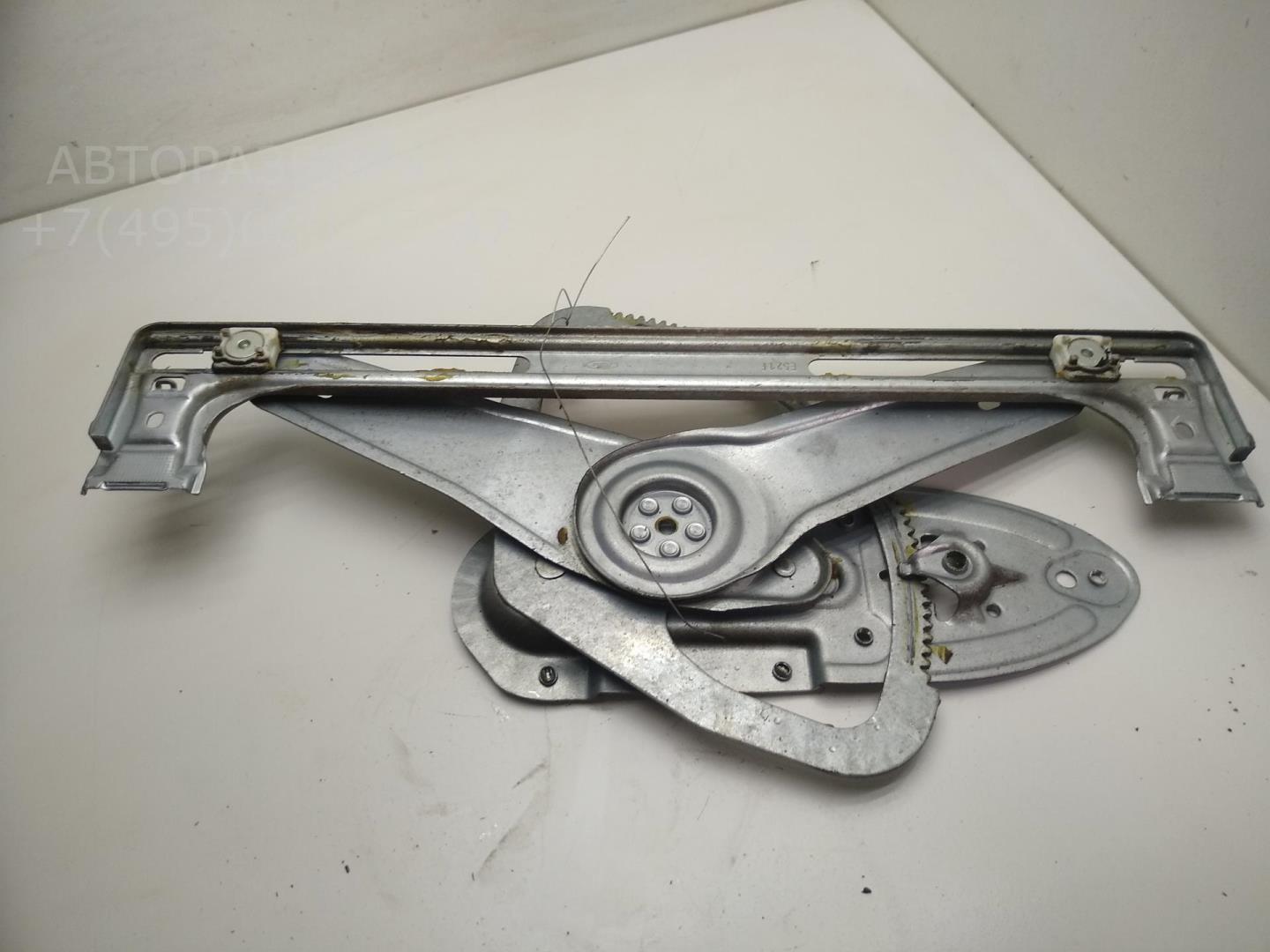 Стеклоподъемник электр. задний левый