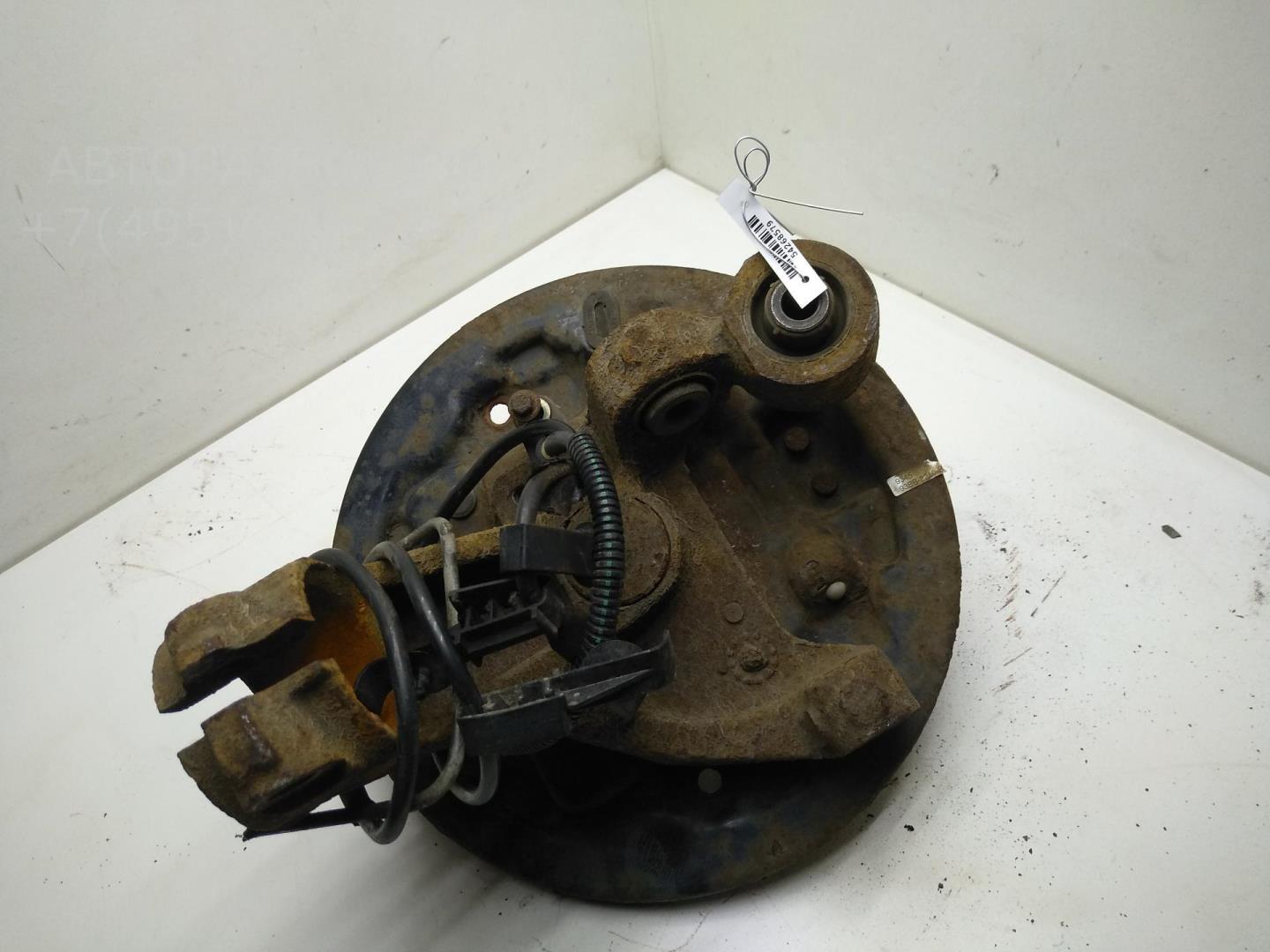 Кулак поворотный задний левый