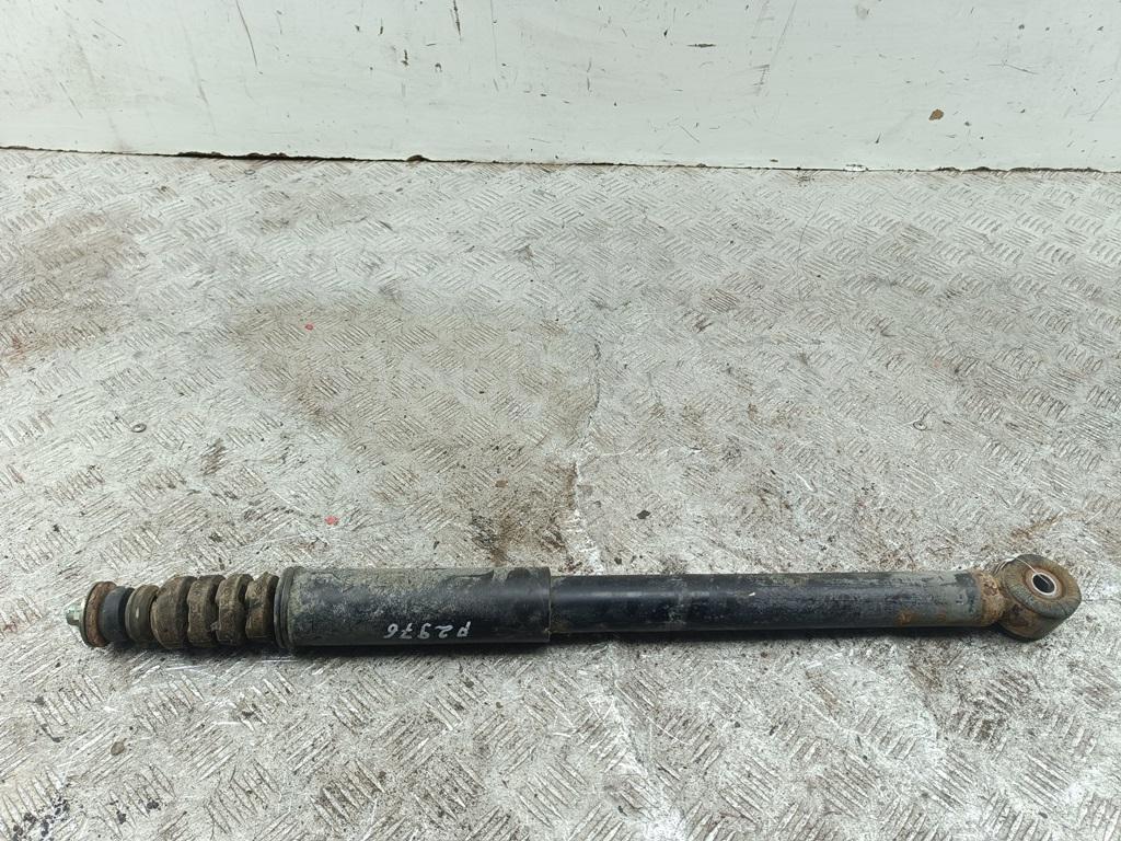 Амортизатор задний левый