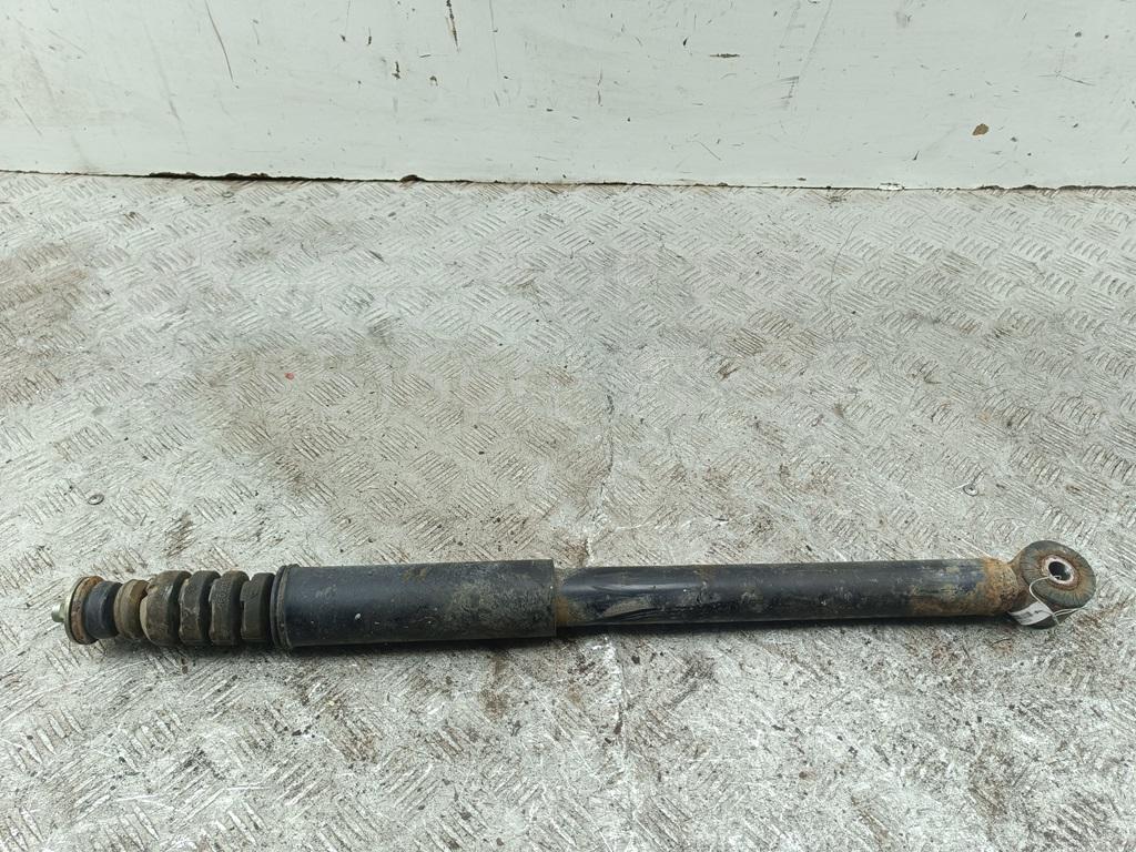 Амортизатор задний левый