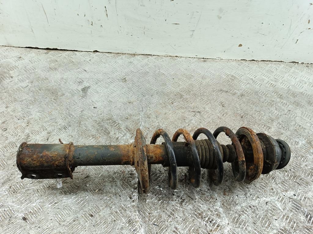 Амортизатор передний левый