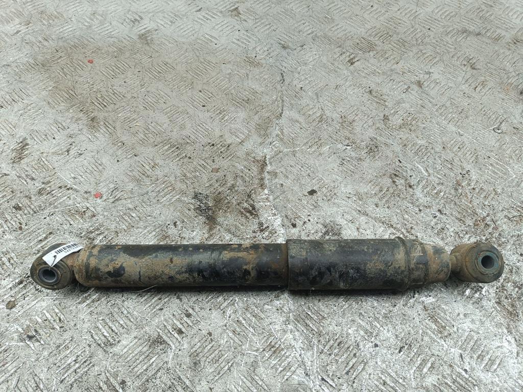 Амортизатор задний левый